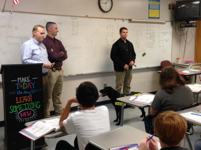 Investigators and Keelo from Cherokee County Sheriffs Office talk to students during Red Ribbon Week